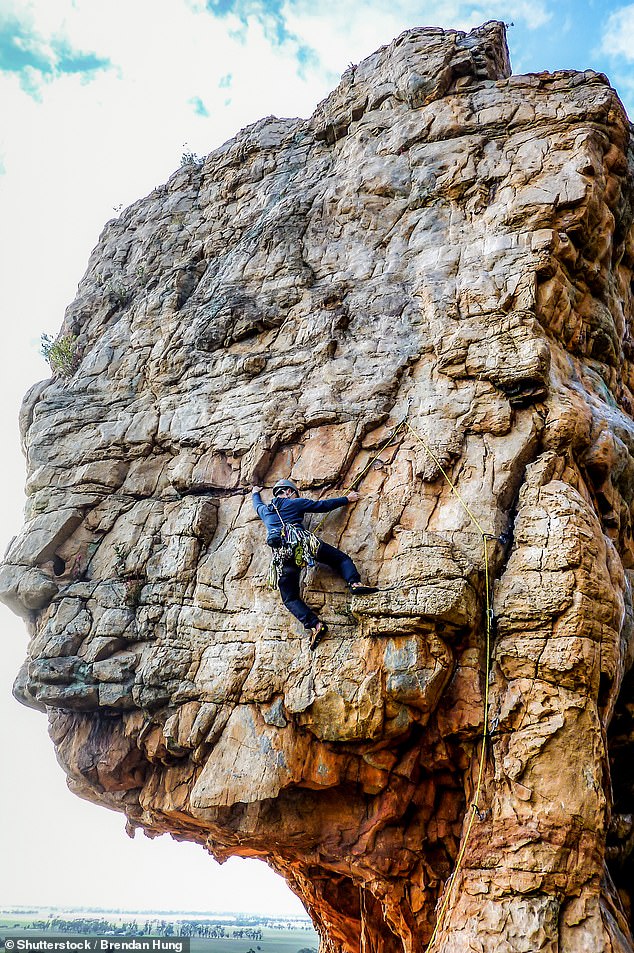 A mountain climber was threatened with a $346,000 fine after his car was linked to alleged cultural heritage violations in the Grampians (photo: a climber on nearby Mount Arapiles)