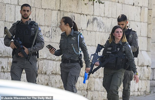 The Palestinian teenager was shot as he fled on foot after allegedly stabbing and wounding an Israeli border police officer at a nearby gas station.  In the photo: the IDF on the ground