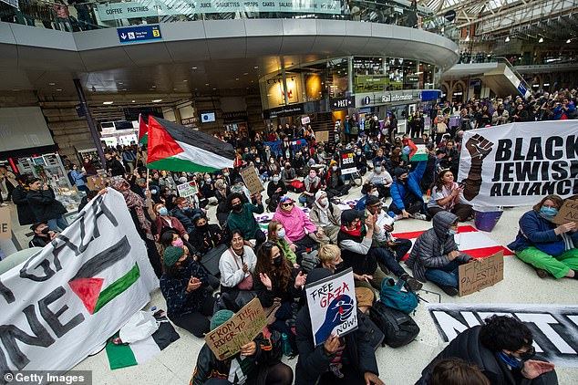 Hundreds of activists hold a pro-Palestine protest at Waterloo station on October 28