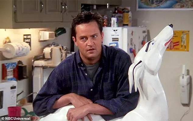 Chandler with the white dog, which became a popular piece of furniture referenced in several episodes of the show