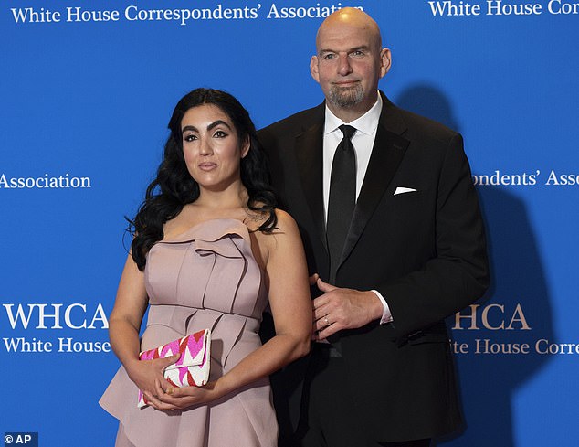 Gisele (left) and Senator John Fetterman (right) pose on the red carpet at the White House Correspondents' Dinner in April after Fetterman checked himself into Walter Reed for treatment for depression in February