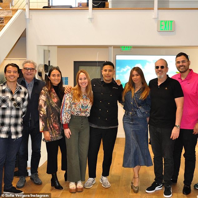 Family affair: Among the group was Sofía's son Manolo Vergara (far left), who posed for a group photo and also had his biography partially included in one of her photos