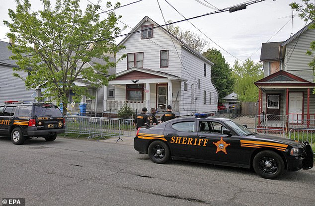 The women could finally escape in May 2013 when the women were left alone at home and for the first time in ten years Berry did not lock her bedroom door.  Castro's house in Cleveland, where they were held imprisoned, shown above