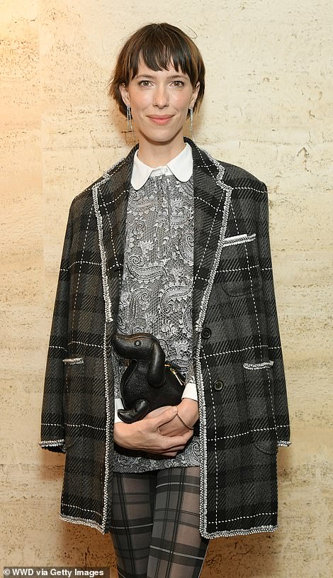 Independent Spirit Award winner Rebecca Hall wore a tartan coat over similarly patterned leggings