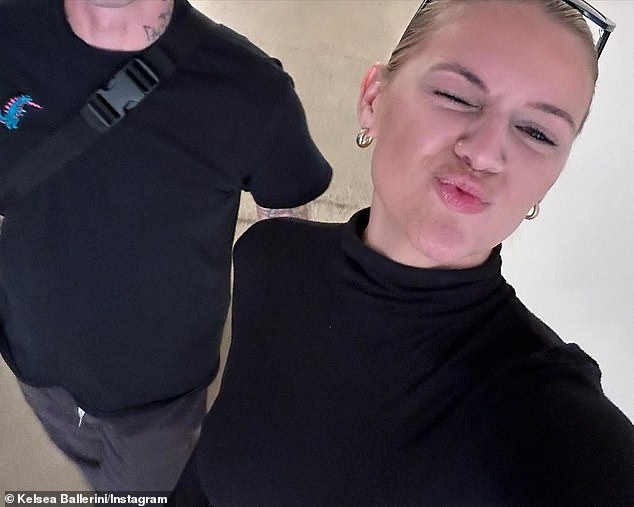 Sweet selfie: As part of her photo dump, she also posted a photo with an unknown man, who did not appear to be her boyfriend based on his tattoos