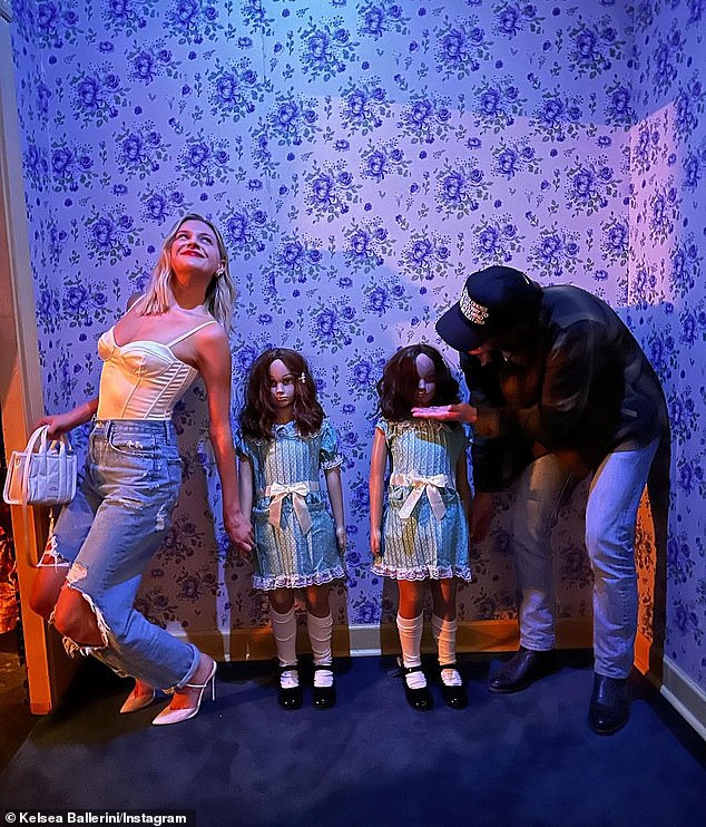 Spooky date: While she was at it, she also took time to enjoy the spooky holiday with Stokes as the pair visited a haunted house and posed with mannequins from The Shining