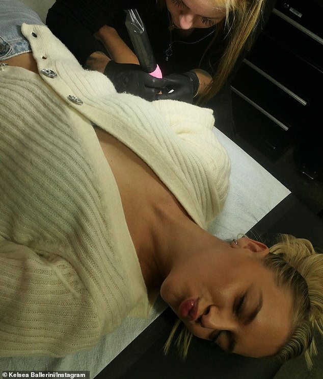 Getting inked: She also posted a photo of herself getting inked, but didn't reveal which tattoo she got