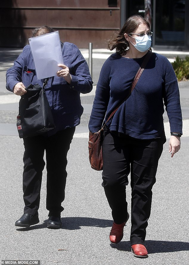 Sarah Franklin (left) leaves court with her sister.  She refused to answer questions