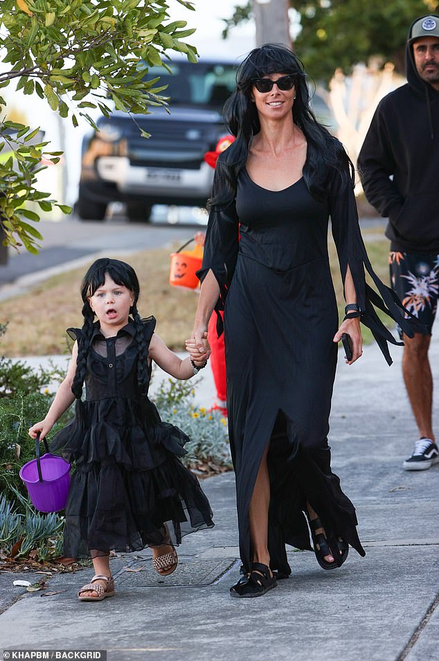 Isla Rose was also dressed in a black dress and appeared to be wearing a witch outfit