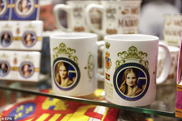 Coffee mugs with a photo of Spain's Crown Princess Leonor are for sale in a shop in central Madrid