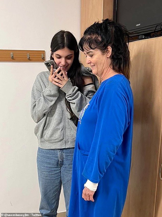 Natalie Raanan and her mother Judith speak with Joe Biden, in a photo released by the US Embassy in Israel on Friday evening