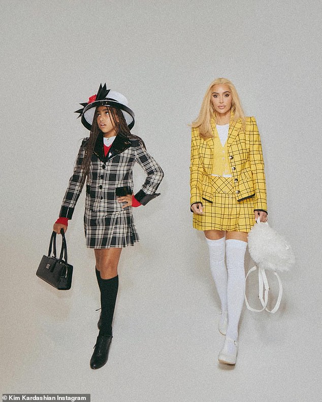 Twining!  The thrice-divorced mother of four enlisted her expensive glam team to find identical schoolgirl costumes, knee high socks and bags for the spooky seasonal shoot