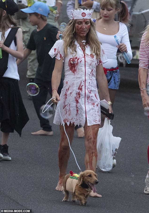 The 47-year-old Spanish-born actress was seen walking barefoot through the streets, wearing a blood-soaked nurse's outfit.