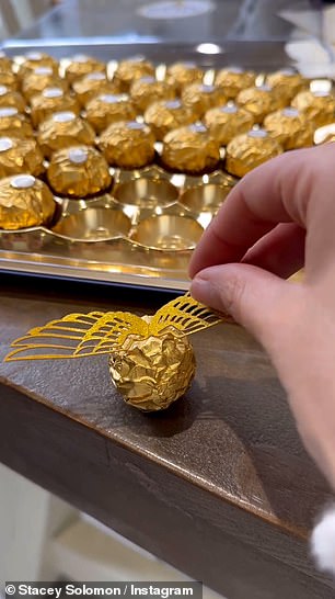 Arts and crafts: Elsewhere, she used gold chocolates to make the famous Quidditch Snitches and added some homemade wings