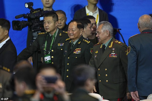 Youxia met with Russian Defense Minister Sergei Shoigu (l) at the forum, amid Russia's war against Ukraine