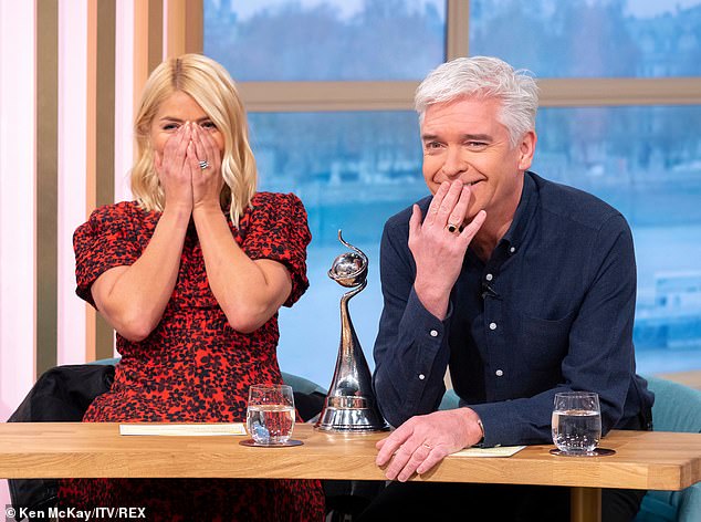 Caption: MailOnline took a look at the beauty's best moments on the show, following her sad and shock exit (pictured with Philip Schofield)