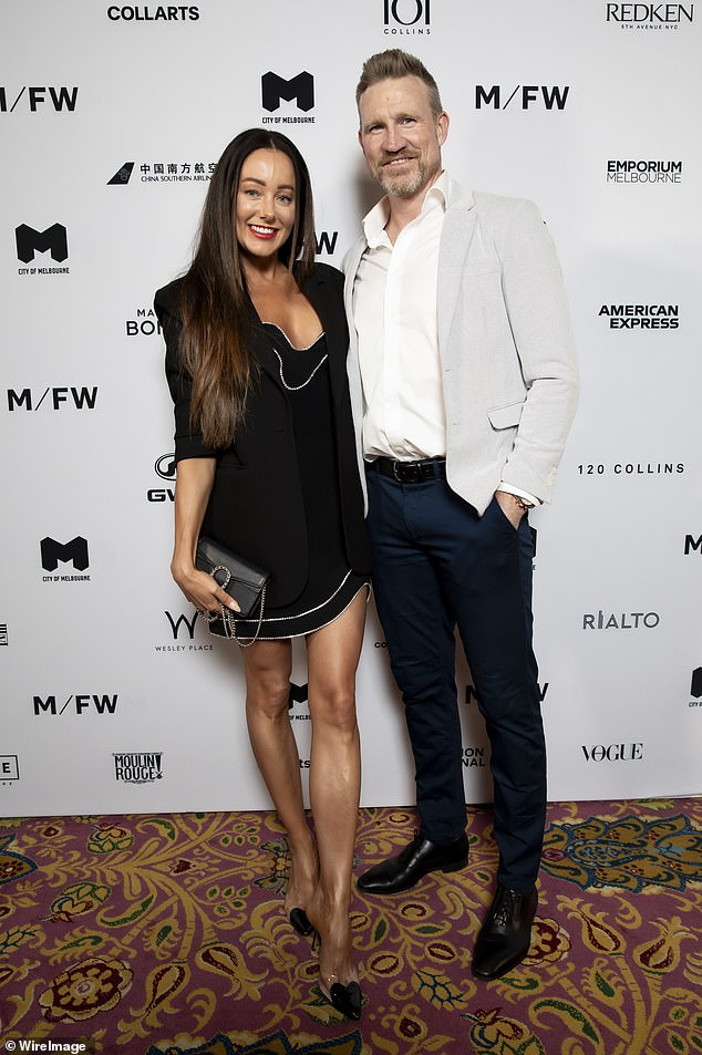 Nathan Buckley and his glamorous girlfriend Brodie Ryan returned to Melbourne Fashion Week on Tuesday night, a year after their public debut