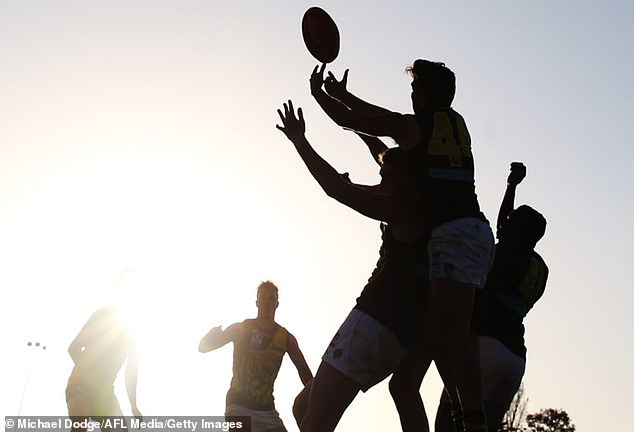 An AFL star has been called out for having sex with a male friend during a threesome with his girlfriend.  Stock image