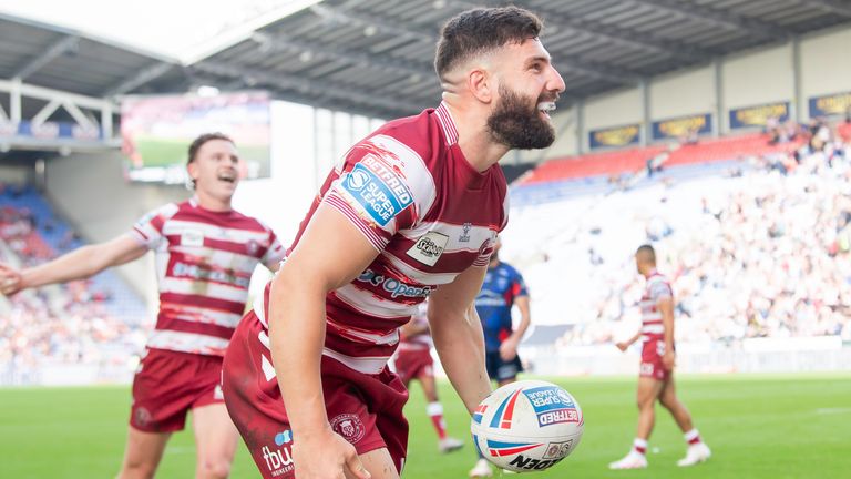 Abbas Miski celebrates a try in Wigan's semi-final win over Hull KR