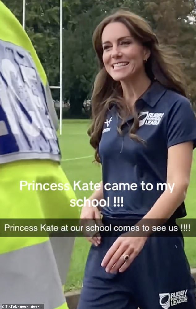 A sporty-looking Kate Middleton delighted schoolchildren as she greeted them with high fives during a visit to Hull today