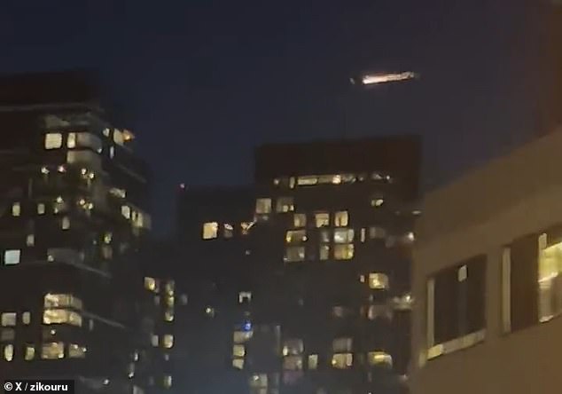 A plane over Seattle appeared to be on fire in videos posted online Saturday night, sparking fear on social media — but the incident was a false alarm