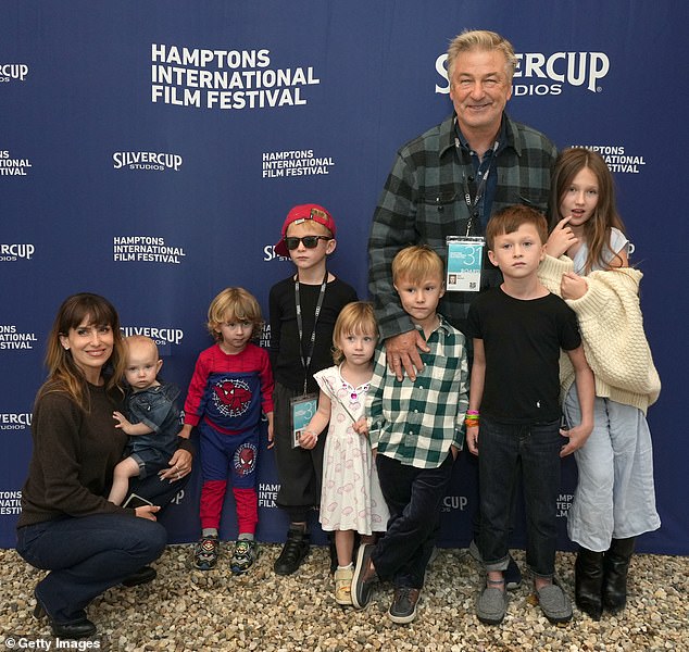 Parents of seven: The parents posed with Ilaria, one, Eduardo, three, Leonardo, seven, Maria, two, Romeo, five, Rafael, eight, and Carmen, 10