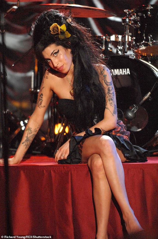 Iconic: Grammy-winning singer Amy Winehouse - who died on July 23, 2011 at the age of 27 - continues to enjoy phenomenal success long after her death (pictured in 2008)