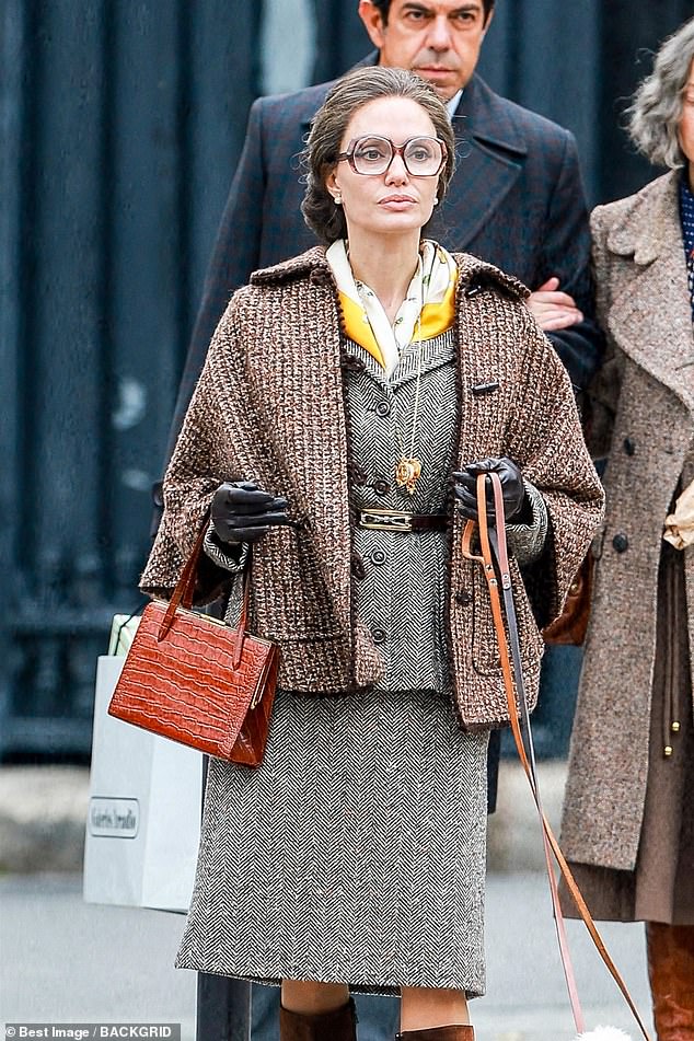 In character: Angelina looked almost unrecognizable as she was spotted filming her new film in Paris on Thursday