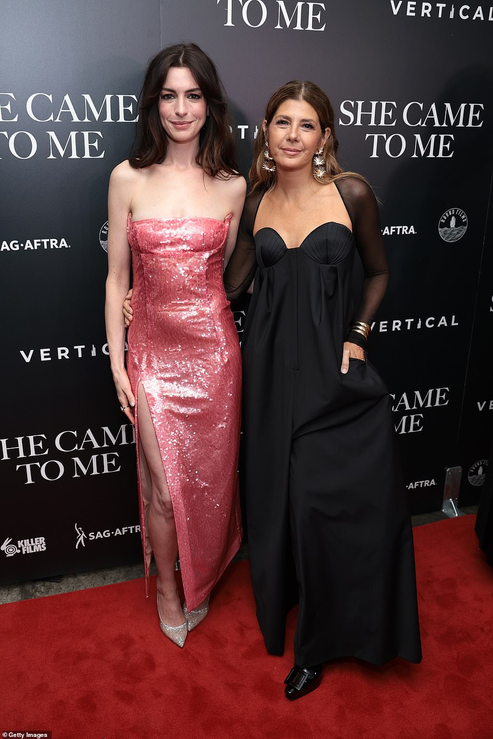 Simply stunning!  Anne Hathaway and Marisa Tomei put on a style tour de force on Tuesday night as they supported their upcoming romantic comedy She Came To Me in New York City