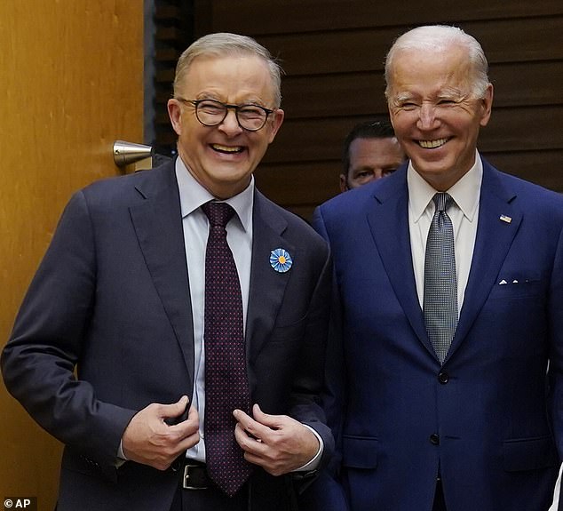 Anthony Albanese (pictured left) is criticized for flying to the US to meet President Joe Biden (right) rather than face the fallout from Indigenous Voice and the loss of the parliamentary referendum