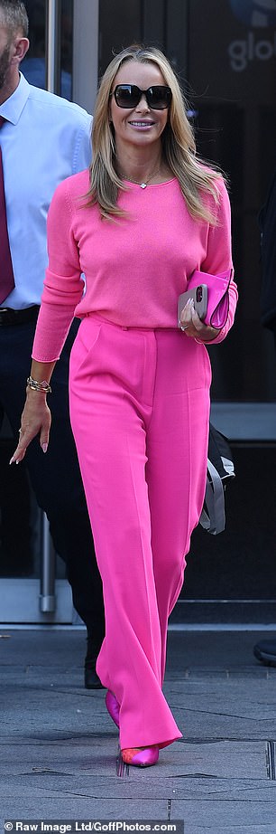 Pink: The modern star went full Barbie with her David Koma tailored trousers, bag and heels in the same brilliant color