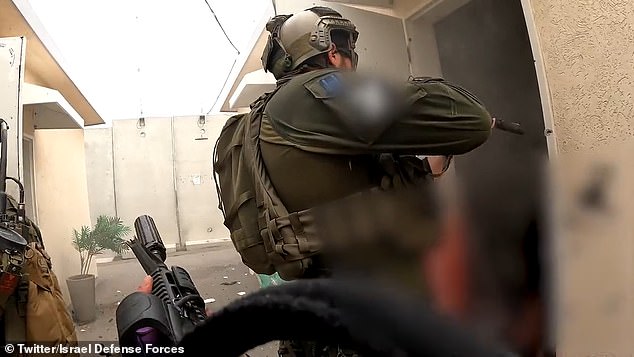 Members of Israel's elite Flotilla 13 unit are seen taking back a checkpoint near the Gaza border from Hamas on Saturday.