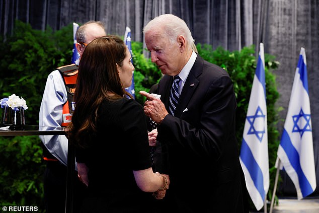 President Joe Biden shakes Dr.  Jordanna Hadas Link hands during a meeting with Israeli first responders, family members and other civilians directly affected by the October 7 attack on Israel by Hamas, in Tel Aviv