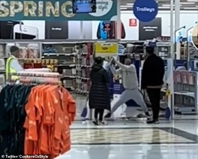 An angry Big W customer has been filmed tearing apart a store's security scanners in a furious outburst