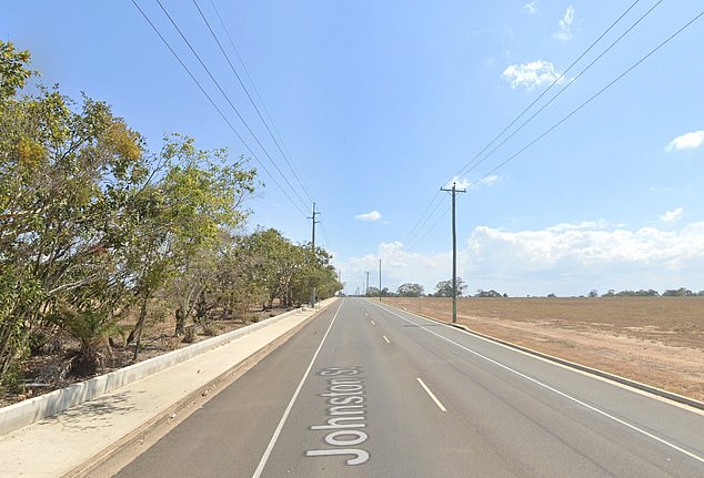 A body was found inside a burning vehicle on Johnson Street in Bundaberg (pictured) late on Tuesday at about 8.20pm after emergency crews were alerted to a grass fire on vacant land in the area.