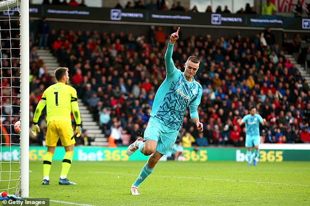 Sasa Kalajdzic celebrates scoring the winner for Wolves as they inflict defeat on Bournemouth