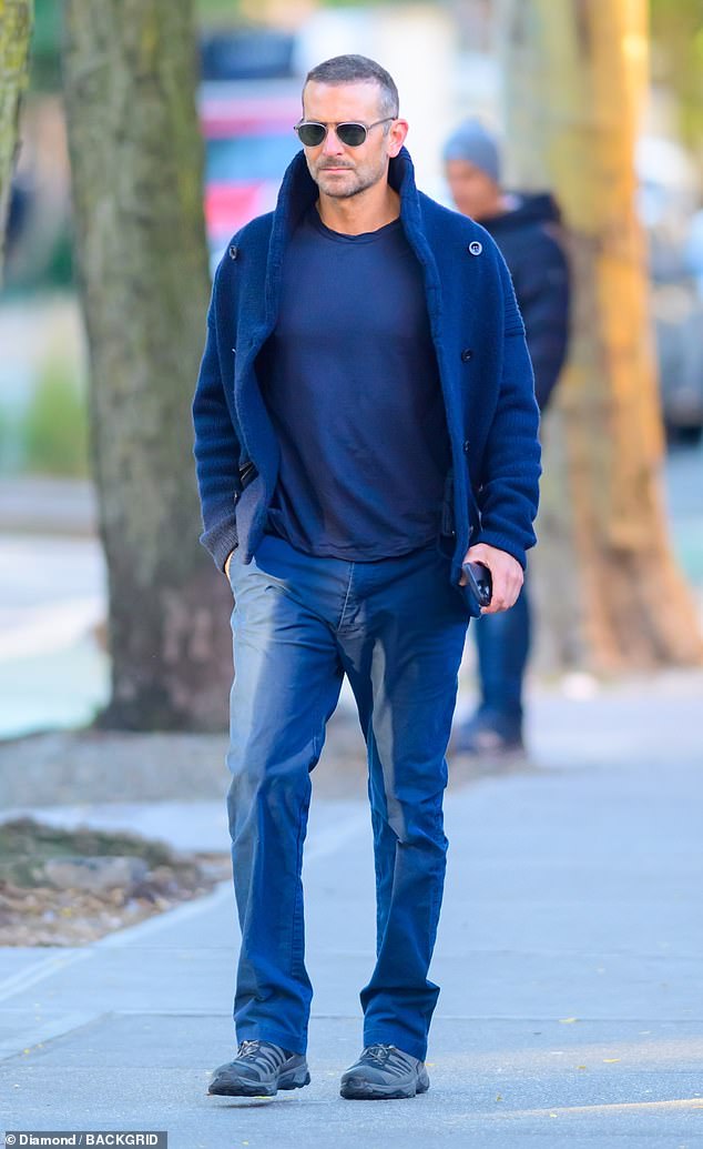 Out and about: Bradley Cooper stepped out in a trendy navy blue look in New York on Friday