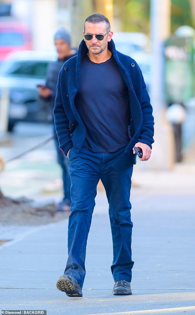 Solo: The 48-year-old actor ¿ who is 'very excited' to be dating Gigi Hadid , 28 ¿ was alone in the Big Apple while wearing aviator sunglasses and sporting a short haircut