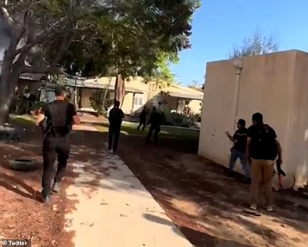 A chilling video has emerged of the moment Hamas terrorists rushed to homes in the Be'eri kibbutz and unleashed a hail of bullets on the terrified families living there.