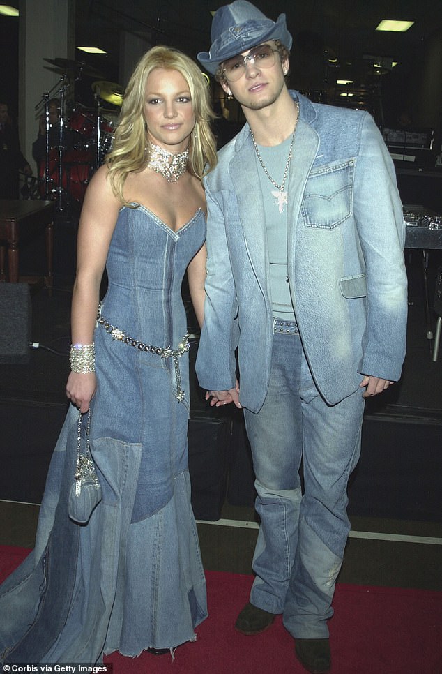 'I was in a coma in Louisiana and he was happily running around Hollywood': Britney Spears revealed she was devastated when Justin Timberlake broke up with her via text message, according to The New York Times;  they are pictured in January 2001