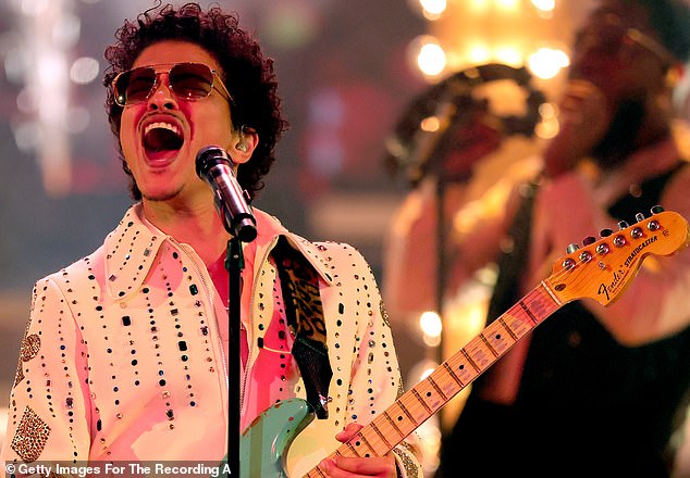 Cancelled: Bruno Mars' sold-out Saturday night concert in Tel Aviv has been canceled due to the bloody outbreak of the Israeli-Palestinian conflict;  pictured at the Grammys last year