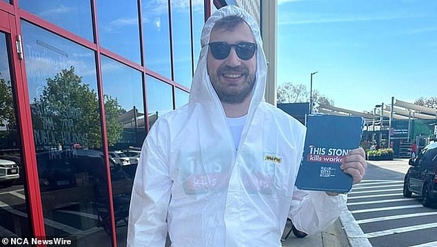 Protesters (pictured) urged the major hardware retailer to consider the impact on workers, such as tradies, who could develop lung cancer as a result of exposure to the deadly silica dust.