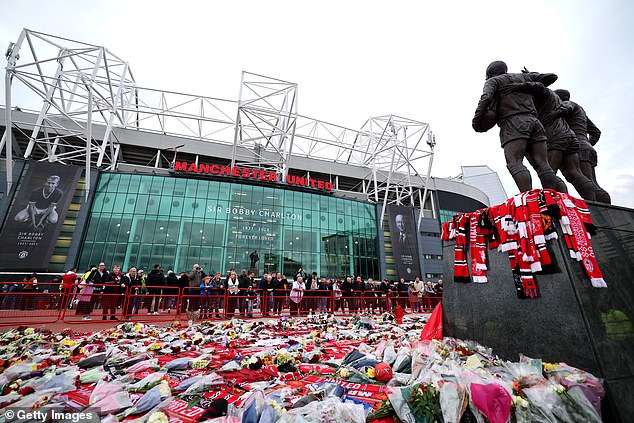 Man United fans came to pay their respects to Sir Bobby Charlton on Tuesday evening
