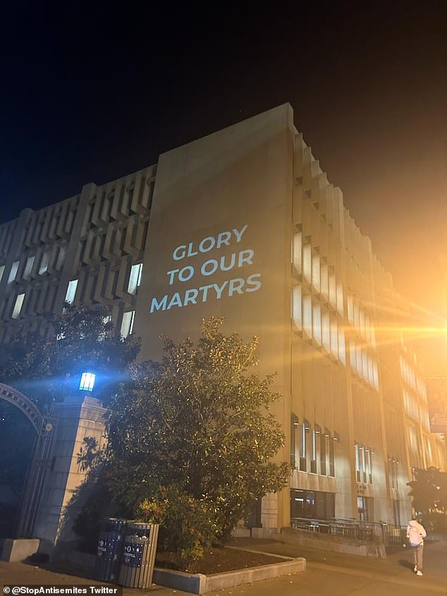 This is one of the shocking images projected in the school's library on Tuesday evening with the text: 'Glory to our martyrs'