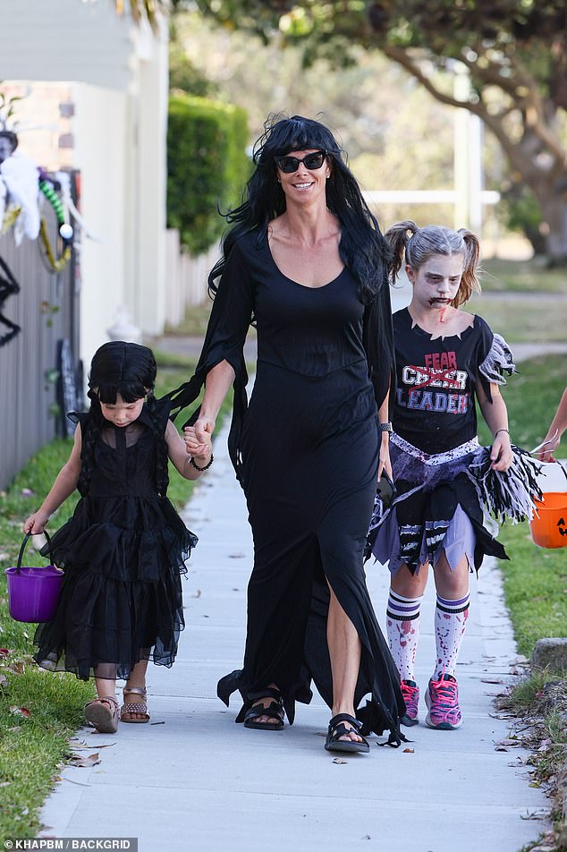 Get into the Halloween spirit!  Candice Warner went trick-or-treating with her daughters, Ivy Mae, Indi Rae and Isla Rose in Sydney on Tuesday afternoon.  All depicted