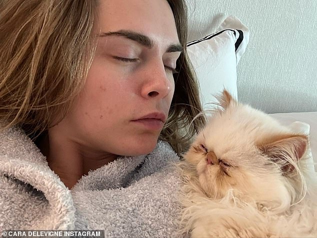 Cara Delevingne urges fans to caption this as she shares