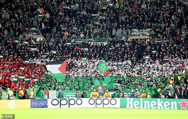 Celtic supporters defied a ban from their club and brought Palestinian flags to their Champions League match against Atletico