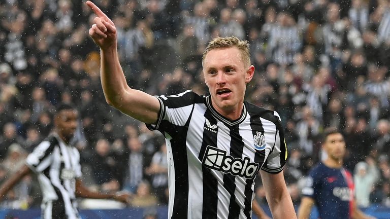 Newcastle United's Sean Longstaff celebrates after scoring the third goal against PSG