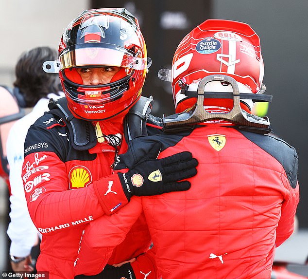 Teammate Carlos Sainz (L) finished P2, completing a shock front row exclusion for Ferrari