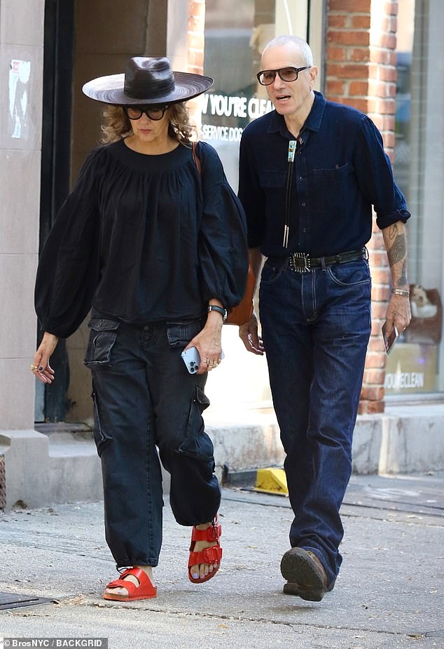 The reclusive three-time Oscar winner, 66, who supported his partner at the premiere of her new film She Came To Me on Tuesday, wore a double denim ensemble during his walk